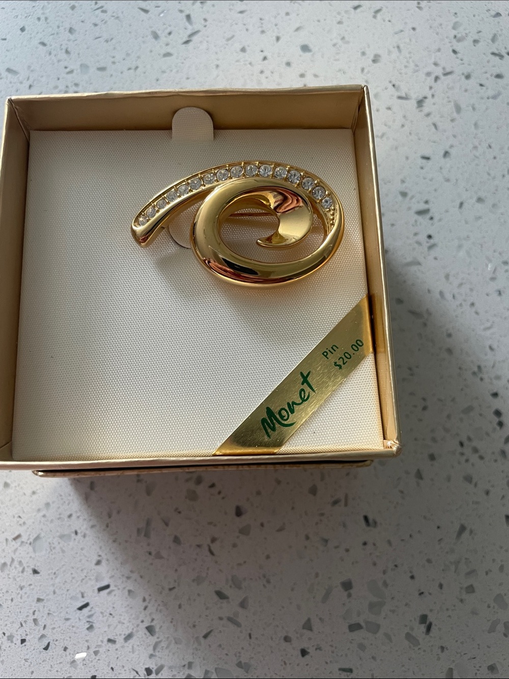 Vintage Monet Gold Tone Spiral Brooch with Clear Crystals